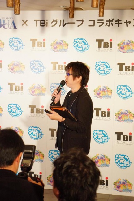 発表会の様子。壇上はスパイシーソフト株式会社執行役員の村山章。